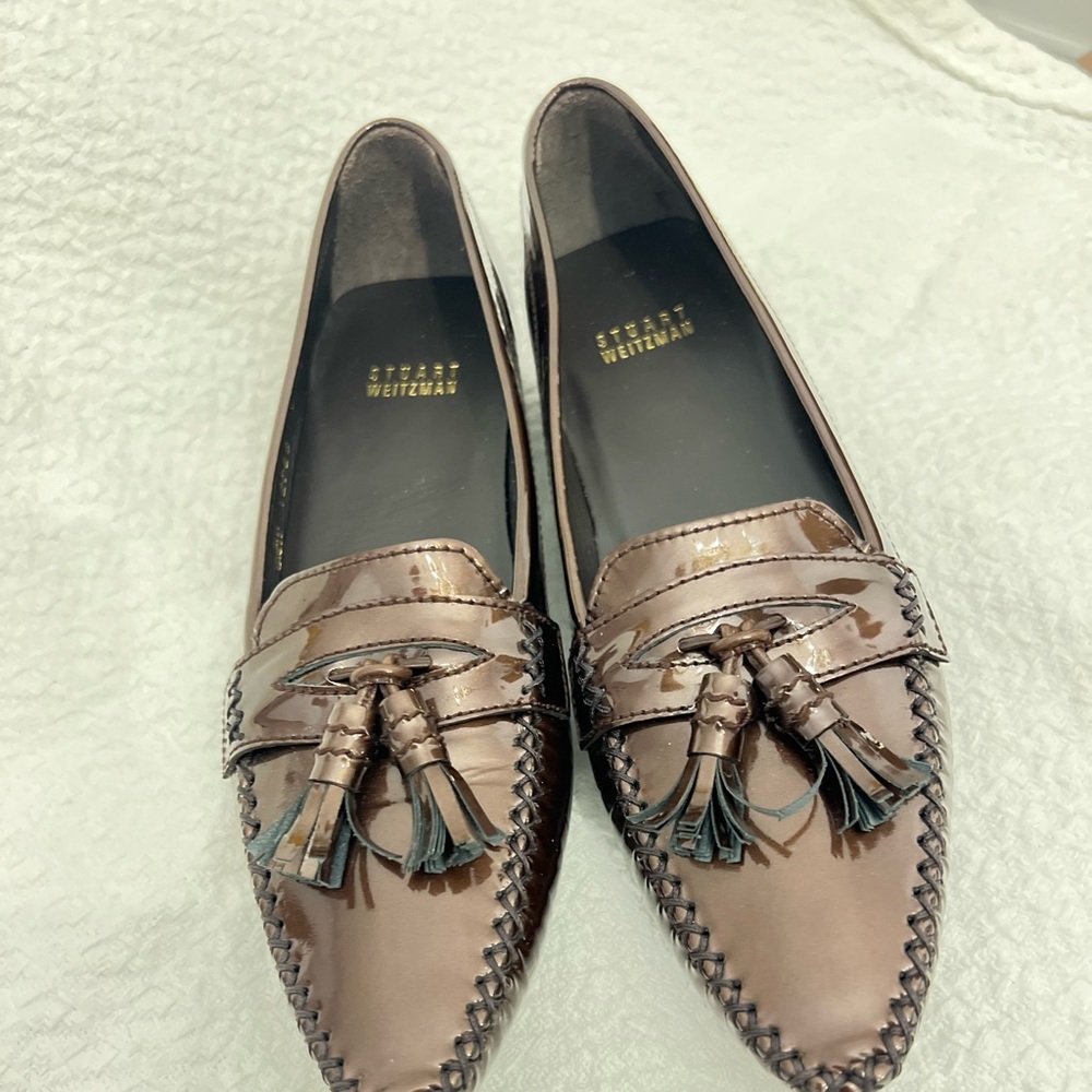 Stuart Weitzman bronze patent leather tasseled loafer